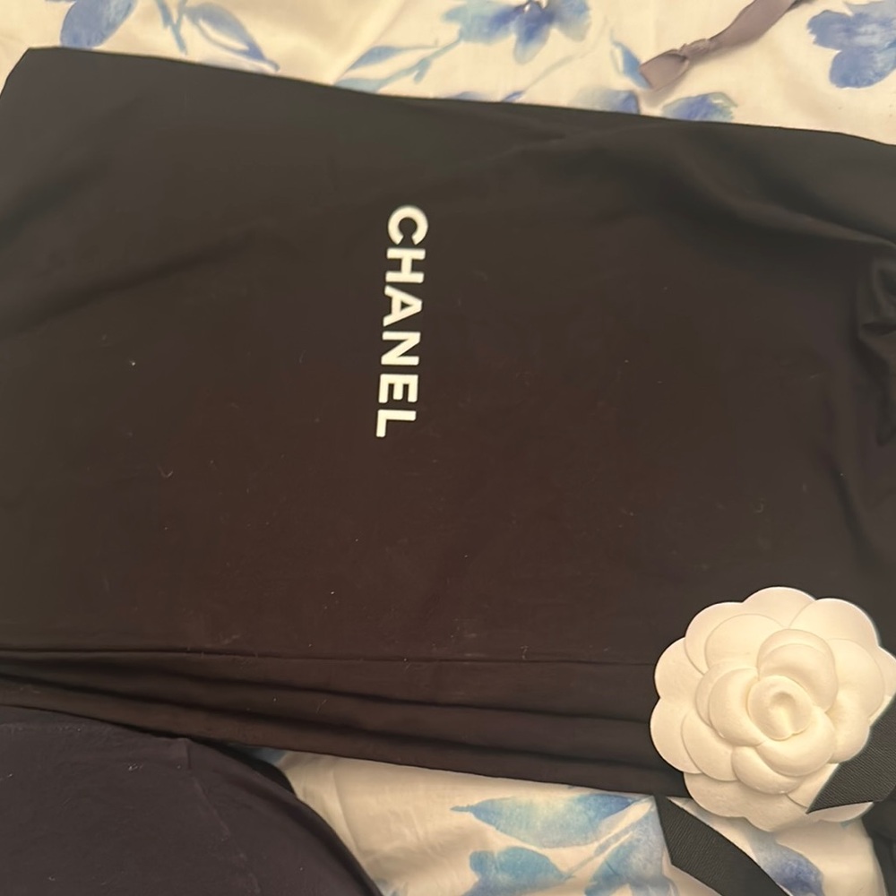 CHANEL Black Bag with White Camellia